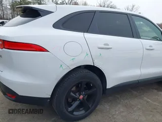 2018 Jaguar F-Pace 25t Premium with VIN SADCJ2FX7JA295057, listed as a IAAI auction lot 41912916 with 58,696 mi miles and . Bid and sale history available at DreamBid. Image 18.
