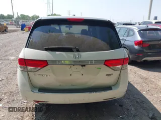 2014 Honda Odyssey EX-L with VIN 5FNRL5H63EB131596, listed as a IAAI auction lot 42402427 with 106,156 mi miles and . Bid and sale history available at DreamBid. Image 16.