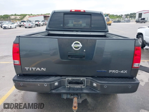2010 Nissan Titan Pro-4X with VIN 1N6BA0EC9AN323943, listed as a IAAI auction lot 42795482 with 200,453 mi miles and . Bid and sale history available at DreamBid. Image 16.