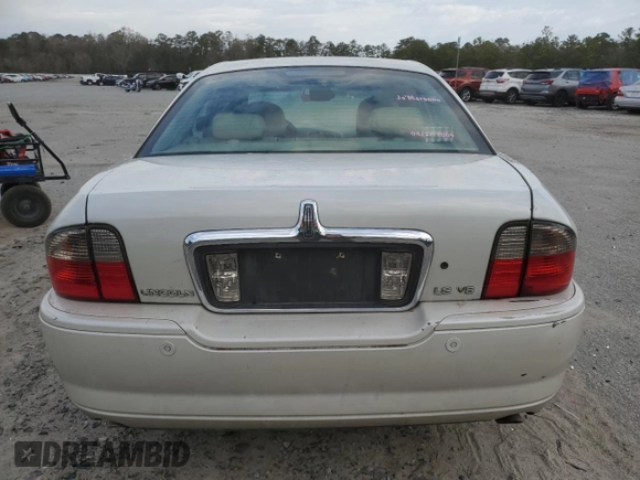 2005 Lincoln LS Sport z VIN 1LNHM87A65Y659418, wystawiony jako Copart lot #86701384 z przebiegiem Nie podano mil oraz Szkoda całkowita • Salvage title. Historia ofert i sprzedaży dostępna na DreamBid. Obrazek 6.
