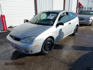 2007 Ford Focus S with VIN 1FAFP31N97W218727, listed as a IAAI auction lot 41001411 with 135,456 mi miles and . Bid and sale history available at carsss.com. Image 2.