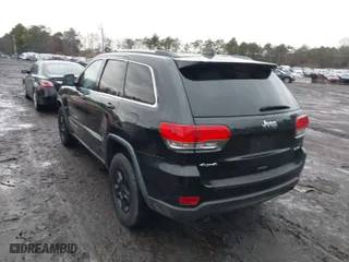 2014 Jeep Grand Cherokee Laredo with VIN 1C4RJFAG7EC119978, listed as a IAAI auction lot 41161797 with 140,823 mi miles. Bid and sale history available at carsss.com. Image 3.