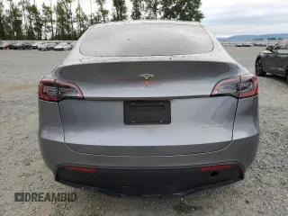 2024 Tesla Model Y Long Range with VIN 7SAYGDEE1RF159332, listed as a Copart auction lot 61179495 with 9,259 mi miles and Salvage title. Bid and sale history available at DreamBid. Image 6.