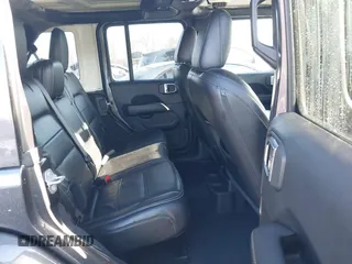 2018 Jeep Wrangler Unlimited Sahara with VIN 1C4HJXEN5JW203879, listed as a IAAI auction lot 41131467 with 87,065 mi miles and . Bid and sale history available at DreamBid. Image 8.