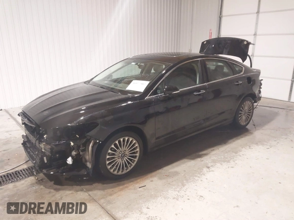 2016 Ford Fusion Titanium with VIN 3FA6P0K96GR197709, listed as a IAAI auction lot 40977902 with 135,259 mi miles. Bid and sale history available at carsss.com. Image 21.