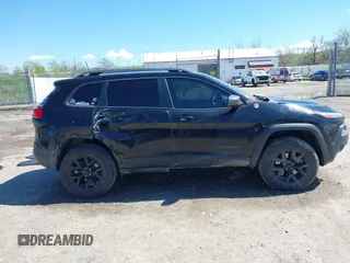 2018 Jeep Cherokee Trailhawk Leather Plus with VIN 1C4PJMBXXJD572667, listed as a IAAI auction lot 42216477 with 85,890 mi miles and . Bid and sale history available at DreamBid. Image 13.