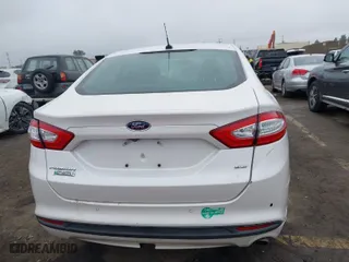 2015 Ford Fusion Energi SE Luxury with VIN 3FA6P0PU7FR284076, listed as a IAAI auction lot 41922445 with 101,276 mi miles. Bid and sale history available at carsss.com. Image 16.