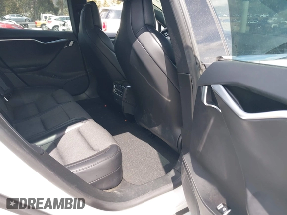 2018 Tesla Model S 75D with VIN 5YJSA1E22JF246928, listed as a IAAI auction lot 41869364 with 100,067 mi miles and . Bid and sale history available at DreamBid. Image 8.