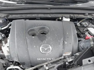 2022 Mazda CX-30 S with VIN 3MVDMBAL8NM411739, listed as a IAAI auction lot 41668265 with 34,964 mi miles and . Bid and sale history available at carsss.com. Image 10.