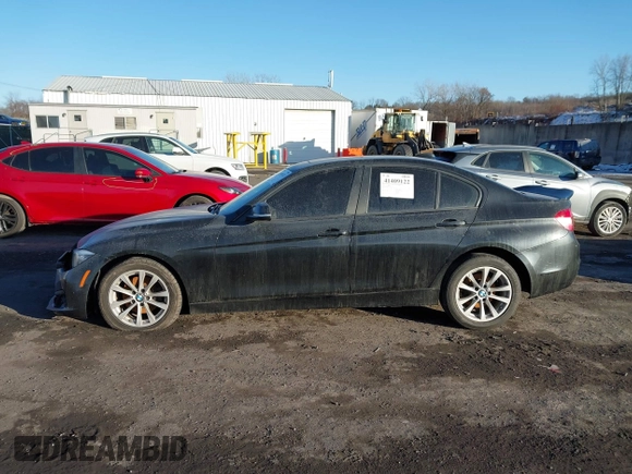2018 BMW 3 Series 320i xDrive with VIN WBA8E5G57JNU47770, listed as a IAAI auction lot 41409122 with 62,198 mi miles. Bid and sale history available at carsss.com. Image 14.