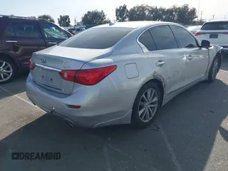 2014 Infiniti Q50 Sport with VIN JN1BV7AP9EM674097, listed as a IAAI auction lot 41741697 with 105,797 mi miles and . Bid and sale history available at DreamBid. Image 4.