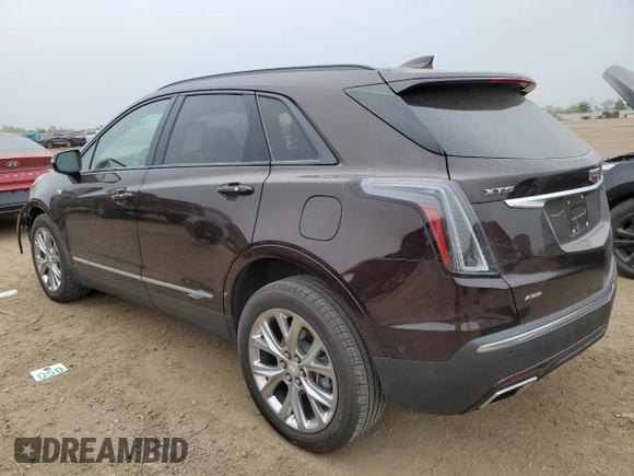 2021 Cadillac XT5 AWD Sport with VIN 1GYKNGRS2MZ142286, listed as a Copart auction lot 60699515 with 17,406 mi miles and Salvage title. Bid and sale history available at DreamBid. Image 2.