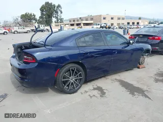 2017 Dodge Charger SE with VIN 2C3CDXBG4HH505166, listed as a IAAI auction lot 41827097 with 145,036 mi miles. Bid and sale history available at carsss.com. Image 4.