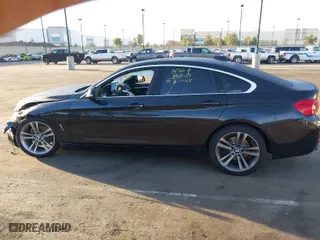2019 BMW 4 Series 430i with VIN WBA4J1C54KBM19114, listed as a IAAI auction lot 41524891 with 52,935 mi miles. Bid and sale history available at carsss.com. Image 14.