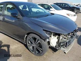 2021 Nissan Sentra SR z VIN 3N1AB8DV0MY290032, wystawiony jako IAAI lot #41819281 z przebiegiem 265 088 mil mil oraz . Historia ofert i sprzedaży dostępna na DreamBid. Obrazek 18.