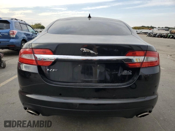 2013 Jaguar XF V6 SC with VIN SAJWJ0EF3D8S85693, listed as a Copart auction lot 75660304 with 70,565 mi miles and Salvage Title. Bid and sale history available at carsss.com. Image 6.