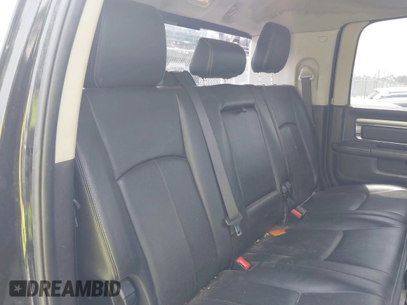 2018 Ram 2500 Laramie with VIN 3C6UR5NLXJG256688, listed as a IAAI auction lot 42168537 with 214,596 mi miles and . Bid and sale history available at DreamBid. Image 8.