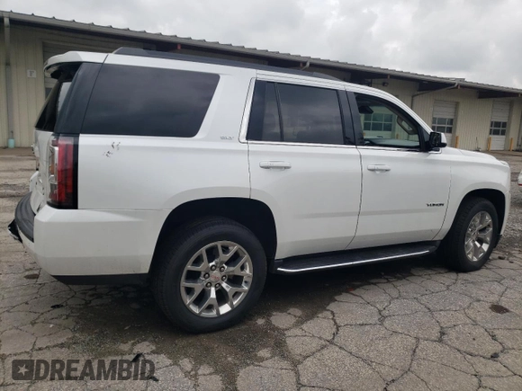 2016 GMC Yukon SLT with VIN 1GKS2BKC0GR265761, listed as a Copart auction lot 65645484 with 130,352 mi miles and Salvage Title. Bid and sale history available at carsss.com. Image 3.