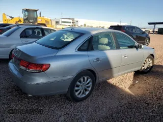 2007 Hyundai Azera SE z VIN KMHFC46F57A205043, wystawiony jako Copart lot #49531885 z przebiegiem 107 272 mil mil oraz Czysty tytuł • Clean title. Historia ofert i sprzedaży dostępna na DreamBid. Obrazek 3.