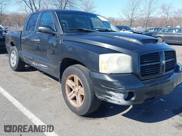 2007 Dodge Dakota SLT z VIN 1D7HW48JX7S196121, wystawiony jako IAAI lot #41863734 z przebiegiem 148 720 mil mil oraz . Historia ofert i sprzedaży dostępna na DreamBid. Obrazek 1.