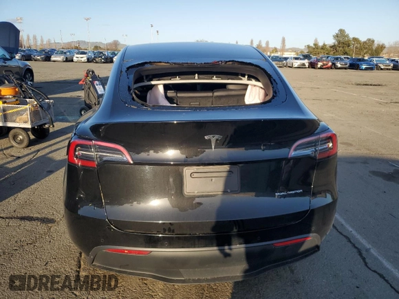 2022 Tesla Model Y Long Range with VIN 7SAYGAEE1NF562042, listed as a Copart auction lot 45702845 with 34,240 mi miles and Salvage Title. Bid and sale history available at carsss.com. Image 6.