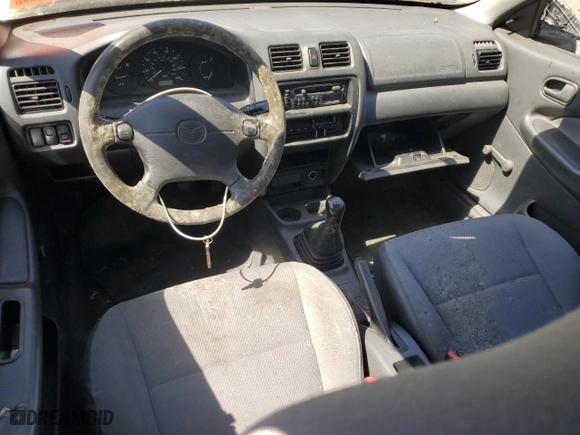 1998 Mazda Protege DX with VIN JM1BC1417W0226912, listed as a Copart auction lot 53711875 with 210,374 mi miles and Clean Title. Bid and sale history available at carsss.com. Image 8.