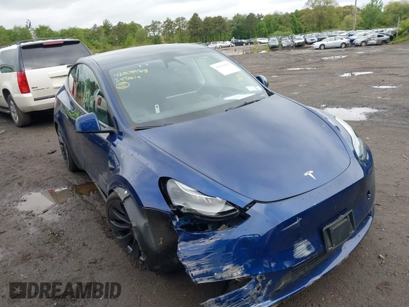 2024 Tesla Model Y Performance z VIN 7SAYGDEF1RA265382, wystawiony jako IAAI lot #42308468 z przebiegiem 9 700 mil mil oraz . Historia ofert i sprzedaży dostępna na DreamBid. Obrazek 13.