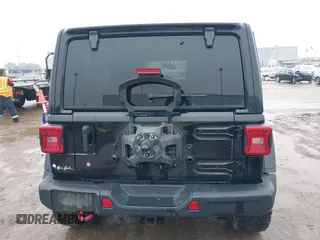 2019 Jeep Wrangler Unlimited Rubicon z VIN 1C4HJXFNXKW511193, wystawiony jako IAAI lot #41452579 z przebiegiem 91 857 mil mil oraz . Historia ofert i sprzedaży dostępna na DreamBid. Obrazek 17.
