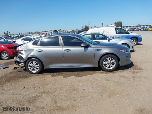 2016 Kia Optima LX with VIN 5XXGT4L39GG116566, listed as a IAAI auction lot 41949407 with 82,679 mi miles. Bid and sale history available at carsss.com. Image 14.