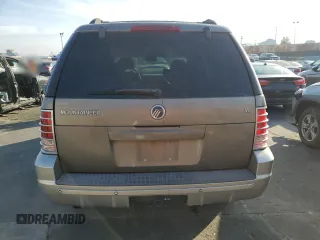 2002 Mercury Mountaineer Convenience z VIN 4M2ZU66W72ZJ38041, wystawiony jako Copart lot #86024514 z przebiegiem 264 952 mil mil oraz Szkoda całkowita • Salvage title. Historia ofert i sprzedaży dostępna na DreamBid. Obrazek 6.
