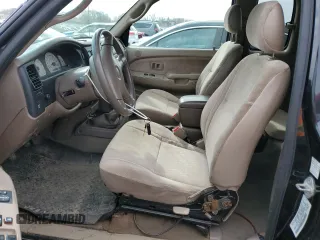 2004 Toyota Tacoma with VIN 5TEWN72N14Z424211, listed as a Copart auction lot 51815615 with 203,415 mi miles and Salvage Title. Bid and sale history available at DreamBid. Image 7.