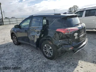 2016 Toyota RAV4 Hybrid XLE with VIN JTMRJREV2GD059101, listed as a Copart auction lot 69439222 with 74,915 mi miles. Bid and sale history available at carsss.com. Image 2.