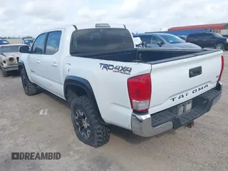 2018 Toyota Tacoma SR with VIN 3TMCZ5AN6JM138747, listed as a IAAI auction lot 42684725 with 144,725 mi miles and . Bid and sale history available at DreamBid. Image 3.
