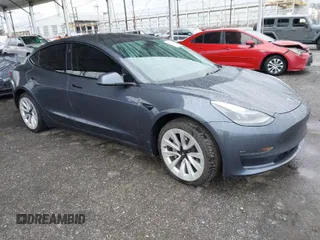 2021 Tesla Model 3 Long Range with VIN 5YJ3E1EB8MF936695, listed as a IAAI auction lot 41778553 with 50,732 mi miles. Bid and sale history available at carsss.com. Image 1.