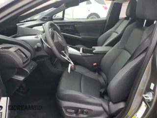 2024 Toyota bZ4X XLE with VIN JTMAAAAA8RA045760, listed as a Copart auction lot 50996385 with 3,833 mi miles and Salvage Title. Bid and sale history available at DreamBid. Image 7.
