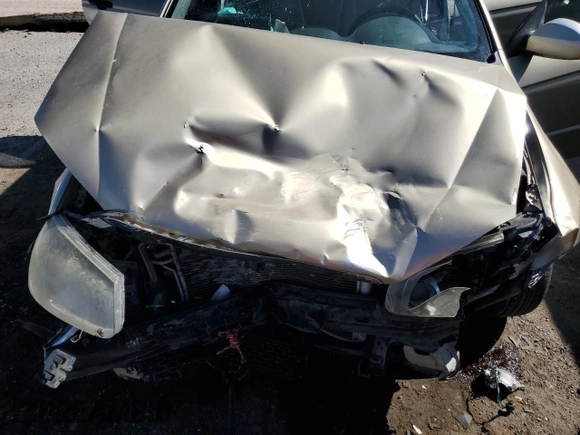 2009 Kia Spectra LX z VIN KNAFE222995667202, wystawiony jako Copart lot #49860315 z przebiegiem 158 498 mil mil oraz Szkoda całkowita • Salvage title. Historia ofert i sprzedaży dostępna na DreamBid. Obrazek 13.