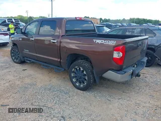 2014 Toyota Tundra Limited with VIN 5TFHW5F19EX400636, listed as a IAAI auction lot 42626818 with 267,402 mi miles and . Bid and sale history available at DreamBid. Image 3.