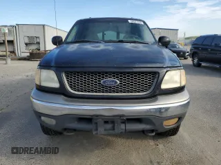 2001 Ford F-150 XL with VIN 1FTRX18L01NA29591, listed as a Copart auction lot 50591035 with 250,345 mi miles and Salvage Title. Bid and sale history available at carsss.com. Image 5.
