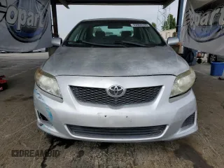 2010 Toyota Corolla with VIN 1NXBU4EE8AZ187793, listed as a Copart auction lot 63909235 with 65,164 mi miles and Salvage title. Bid and sale history available at DreamBid. Image 5.