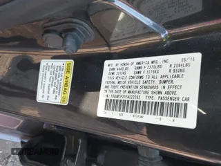 2015 Acura TLX with VIN 19UUB1F31FA023293, listed as a IAAI auction lot 40310652 with 117,350 mi miles. Bid and sale history available at carsss.com. Image 9.
