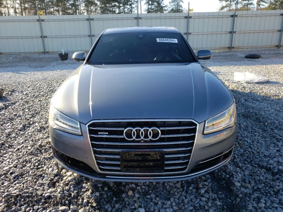 2015 Audi A8 z VIN WAUJGAFD9FN022023, wystawiony jako Copart lot #86048354 z przebiegiem Nie podano mil oraz Szkoda całkowita • Salvage title. Historia ofert i sprzedaży dostępna na DreamBid. Obrazek 5.