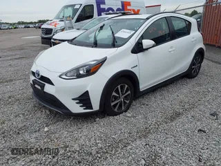 2018 Toyota Prius One with VIN JTDKDTB35J1599544, listed as a IAAI auction lot 42041925 with 79,501 mi miles and . Bid and sale history available at DreamBid. Image 2.