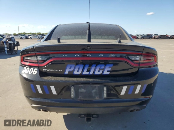 2019 Dodge Charger Police with VIN 2C3CDXAGXKH753432, listed as a Copart auction lot 71969554 with 77,385 mi miles and Clean Title. Bid and sale history available at DreamBid. Image 6.