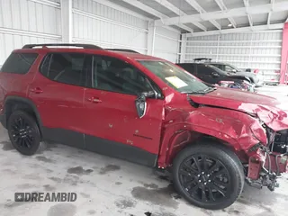 2023 GMC Acadia SLT with VIN 1GKKNMLS4PZ174923, listed as a IAAI auction lot 41393635 with 22,174 mi miles and . Bid and sale history available at DreamBid. Image 6.