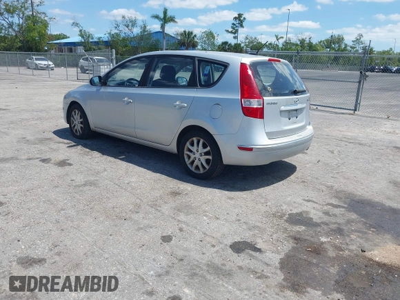 2009 Hyundai Elantra Touring with VIN KMHDC86E99U035163, listed as a IAAI auction lot 42049897 with 123,559 mi miles and . Bid and sale history available at DreamBid. Image 3.