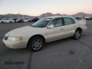 2000 Lincoln Continental with VIN 1LNHM97V0YY807253, listed as a Copart auction lot 80661834 with 130,398 mi miles and Salvage Title. Bid and sale history available at carsss.com. Image 1.