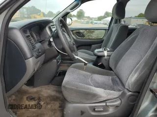 2003 Mazda Tribute LX with VIN 4F2YZ94123KM49852, listed as a Copart auction lot 71779054 with 263,938 mi miles and Salvage Title. Bid and sale history available at carsss.com. Image 7.