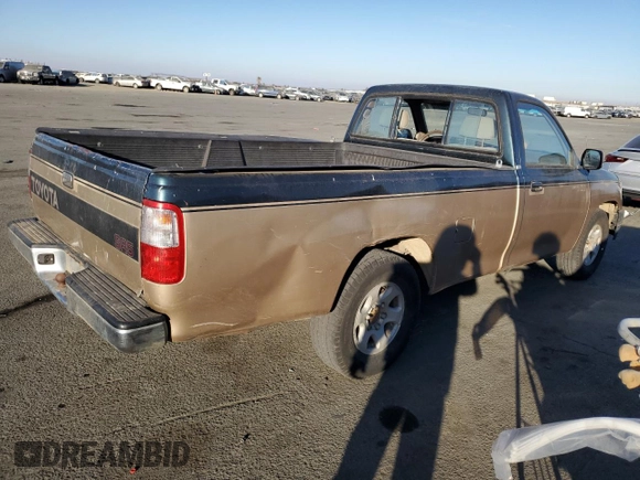 1993 Toyota T100 z VIN JT4VD10C2P0007486, wystawiony jako Copart lot #77669724 z przebiegiem 150 936 mil mil oraz Tytuł czysty. Historia ofert i sprzedaży dostępna na DreamBid. Obrazek 3.