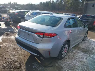 2021 Toyota Corolla LE with VIN JTDEPMAE7MJ173131, listed as a IAAI auction lot 41372716 with 58,677 mi miles. Bid and sale history available at carsss.com. Image 4.