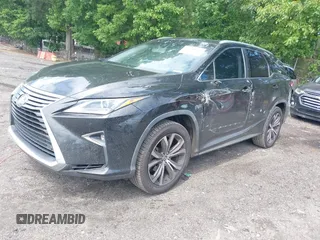 2018 Lexus RX 350L Premium z VIN JTJGZKCA2J2002663, wystawiony jako IAAI lot #42240476 z przebiegiem 159 429 mil mil oraz . Historia ofert i sprzedaży dostępna na DreamBid. Obrazek 2.